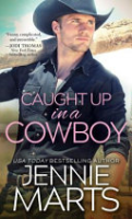 Caught up in a cowboy by Marts, Jennie